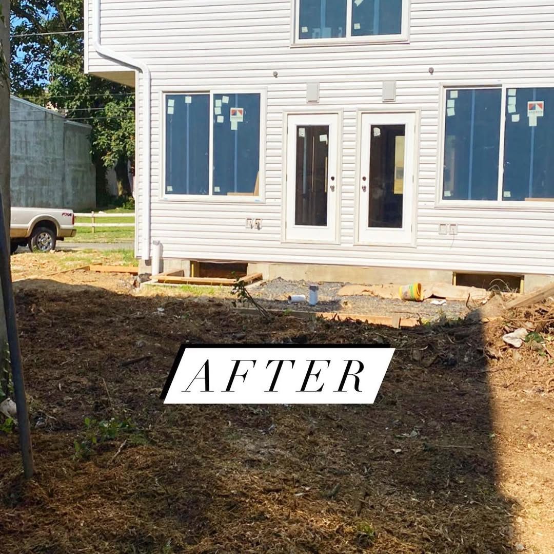 After — tree and stump removed and the yard cleaned by Brennan Tree Service